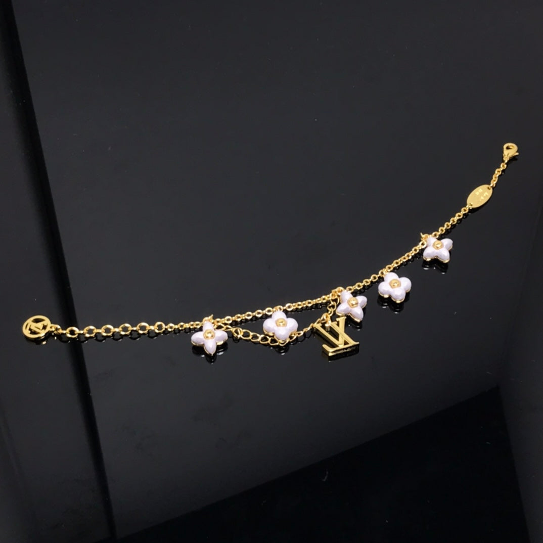 [Spark]LOGO 6 MOTIF STAR AND SUN GOLD BRACELET